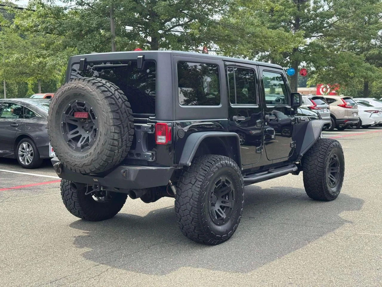 Used 2015 Black Clearcoat Jeep Sport image 8