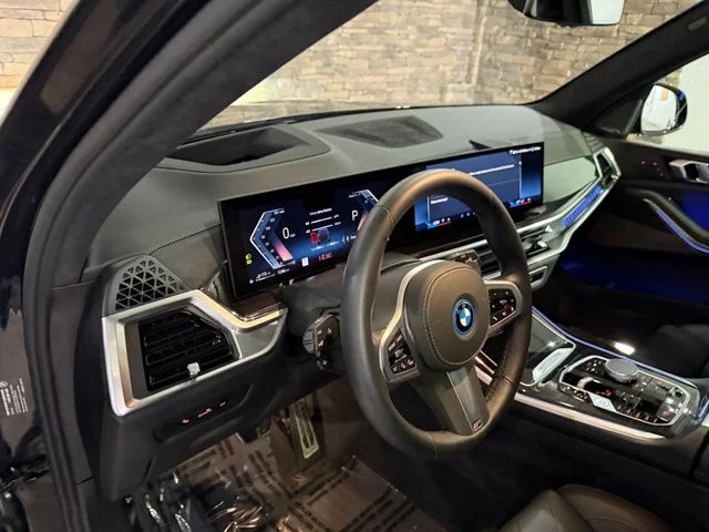 Used 2025 Black Sapphire Metallic BMW xDrive50e image 13