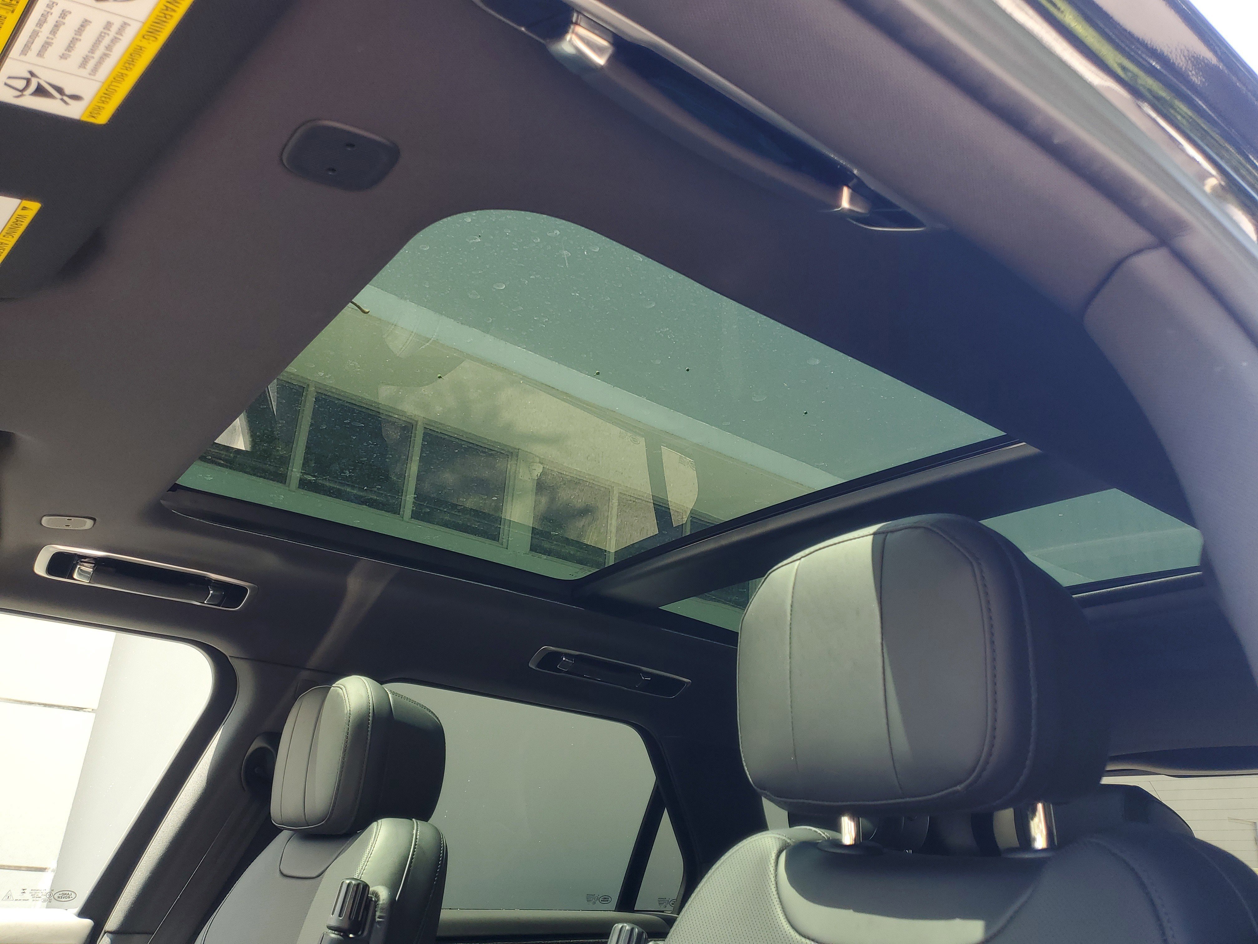 Used 2025 Santorini Black Metallic Land Rover SE image 18