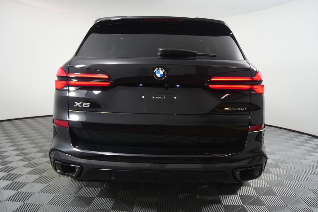 Used 2026 Black Sapphire Metallic BMW sDrive40i image 4