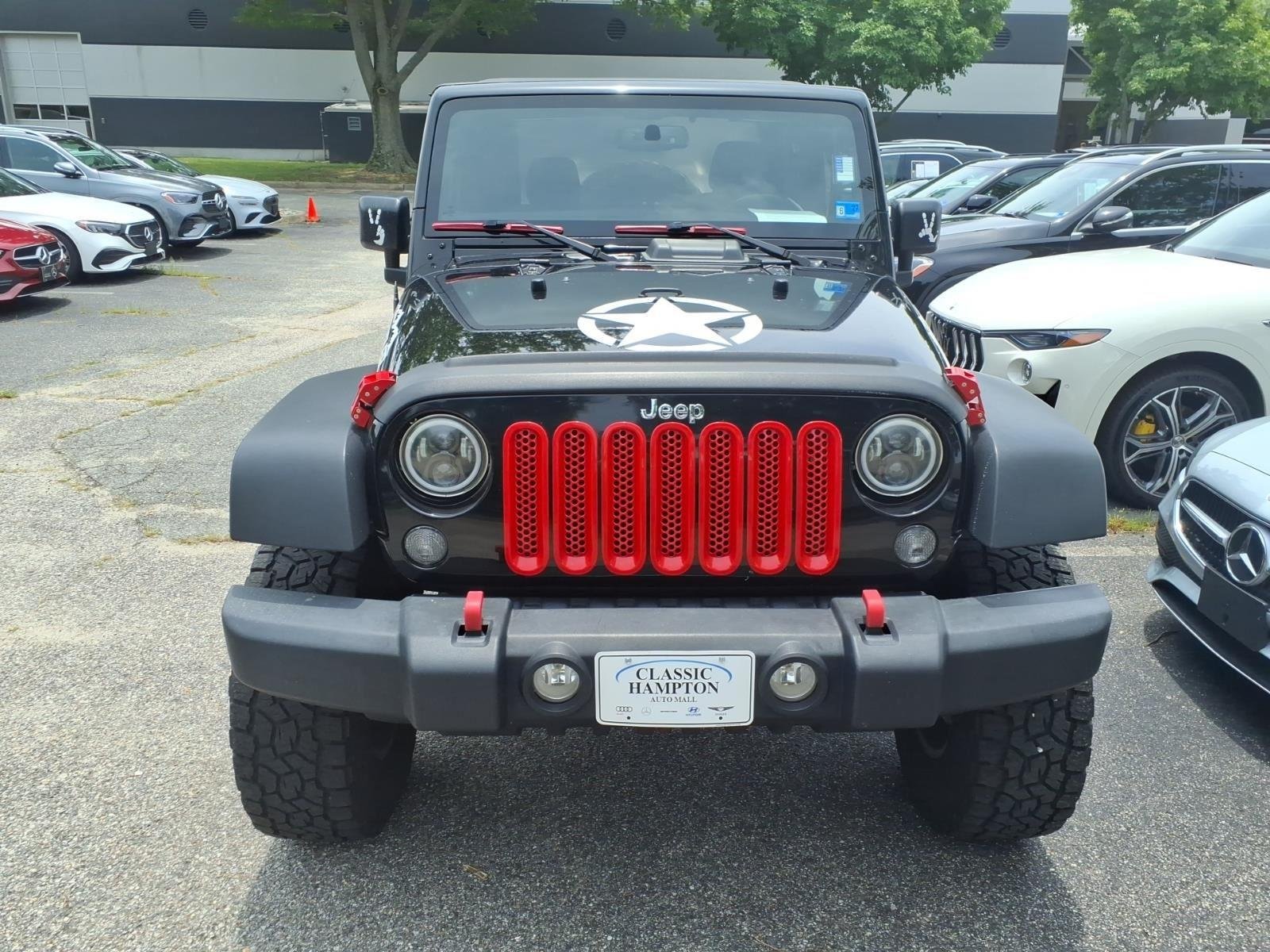 Used 2017 Black Clearcoat Jeep Sport image 2