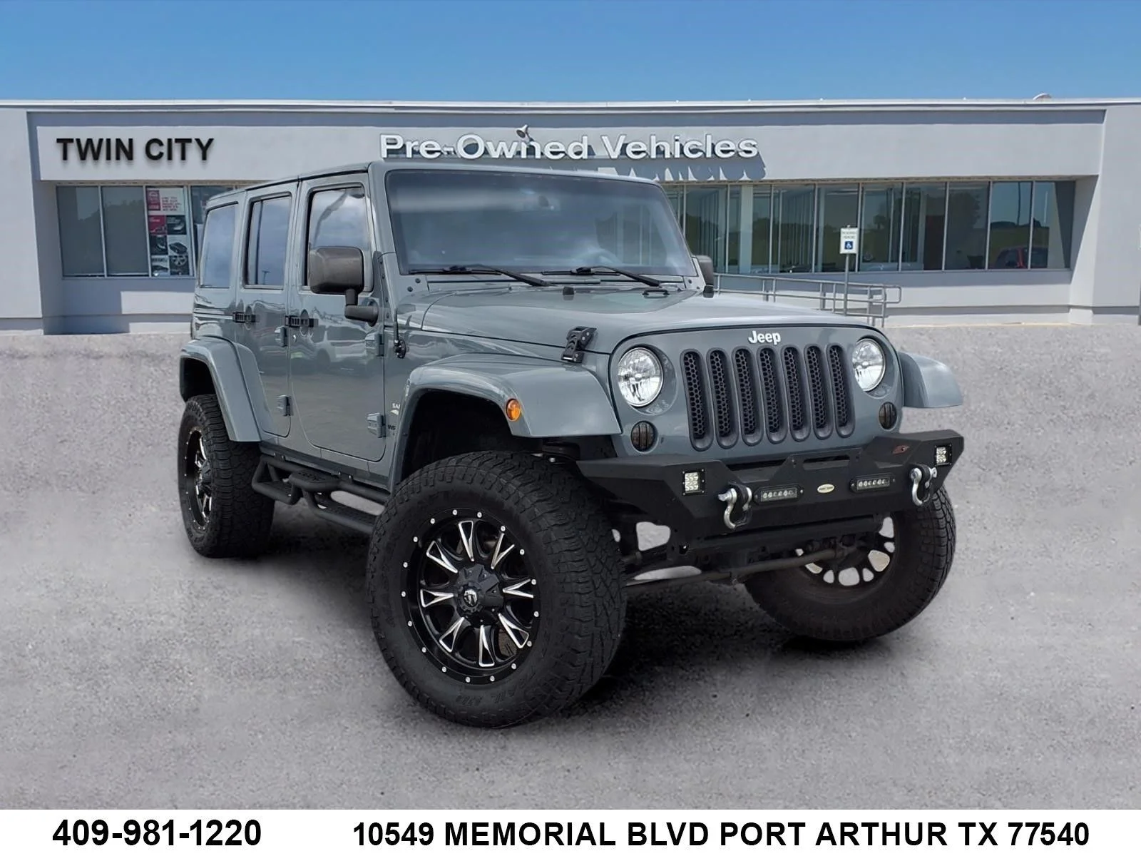 Used 2014 Gray Jeep Unlimited Sahara image 1