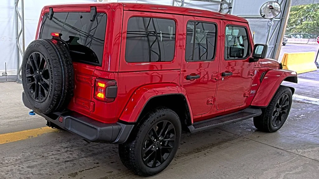 Used 2024 Red Jeep Sahara 4xe image 2