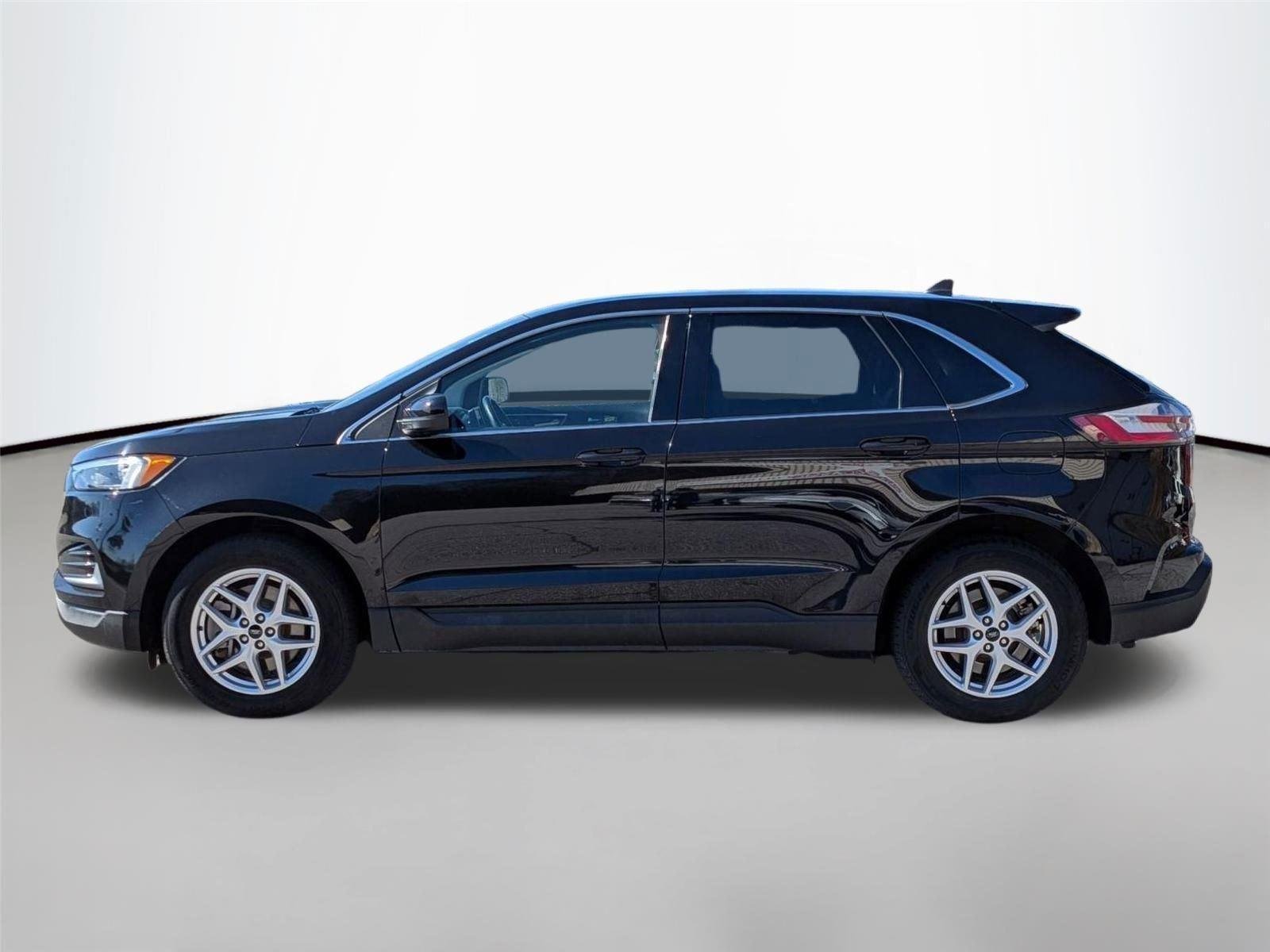 Used 2023 Agate Black Metallic Ford SEL image 8
