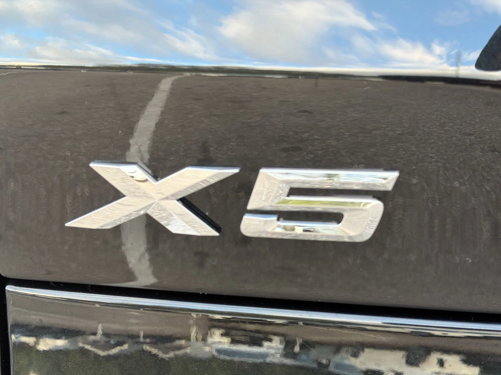 New 2026 Black Sapphire Metallic BMW xDrive50e image 11