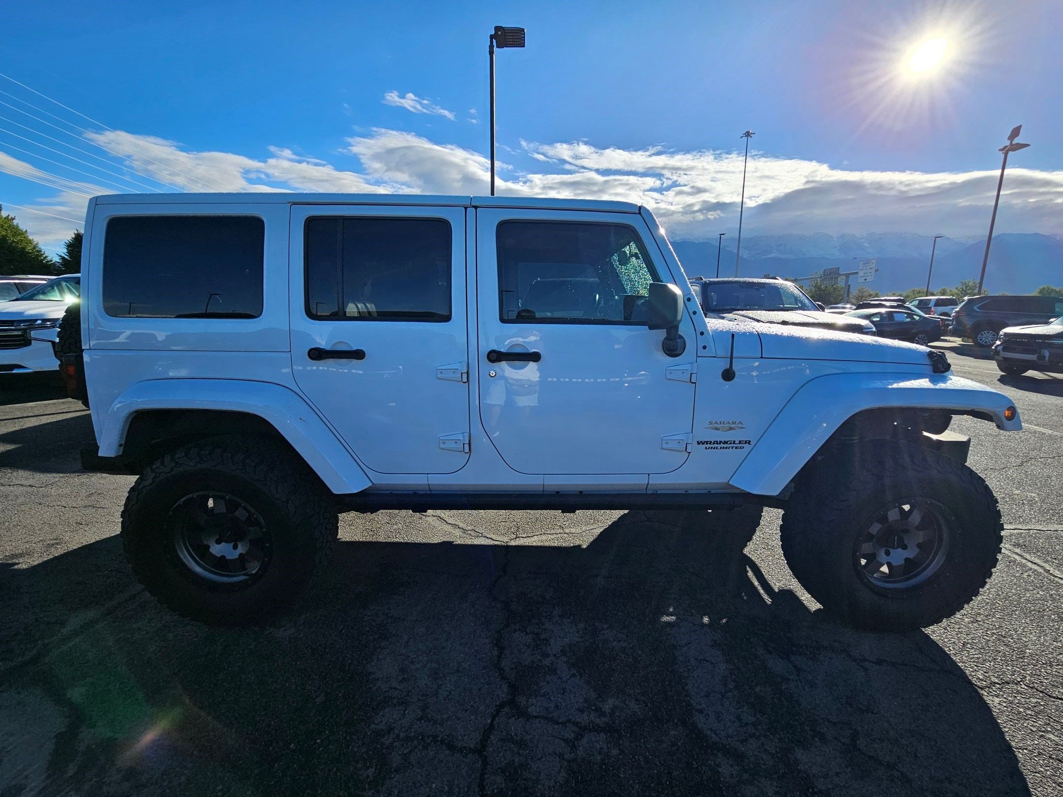Used 2013 Bright White Clearcoat Jeep Sahara image 2