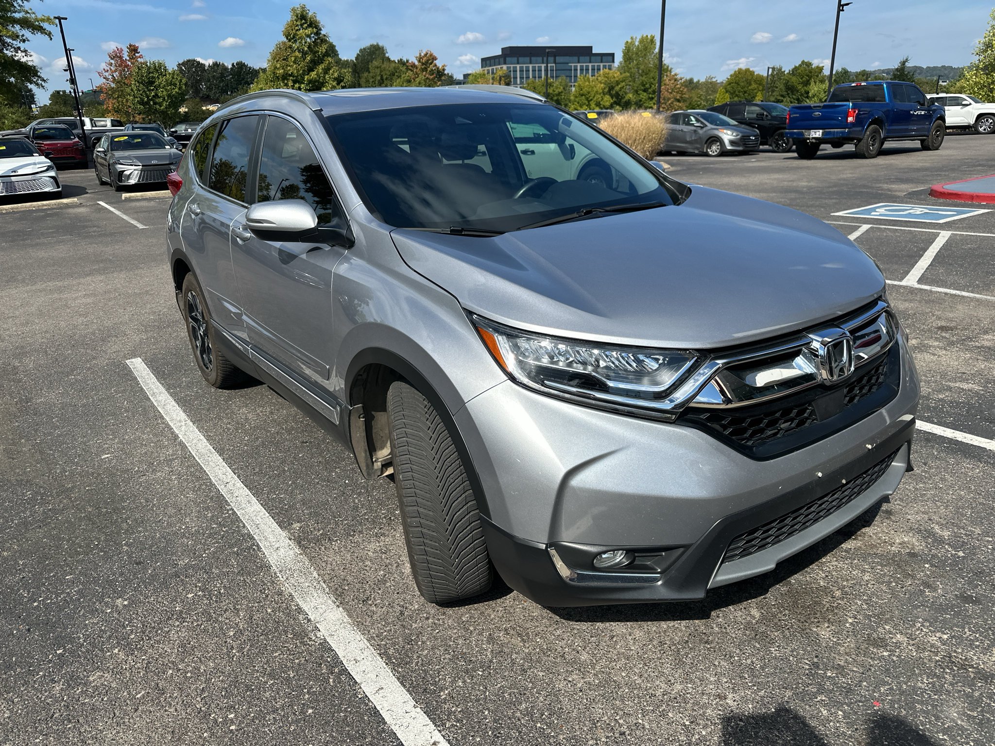 Used 2018 Lunar Silver Metallic Honda Touring image 1