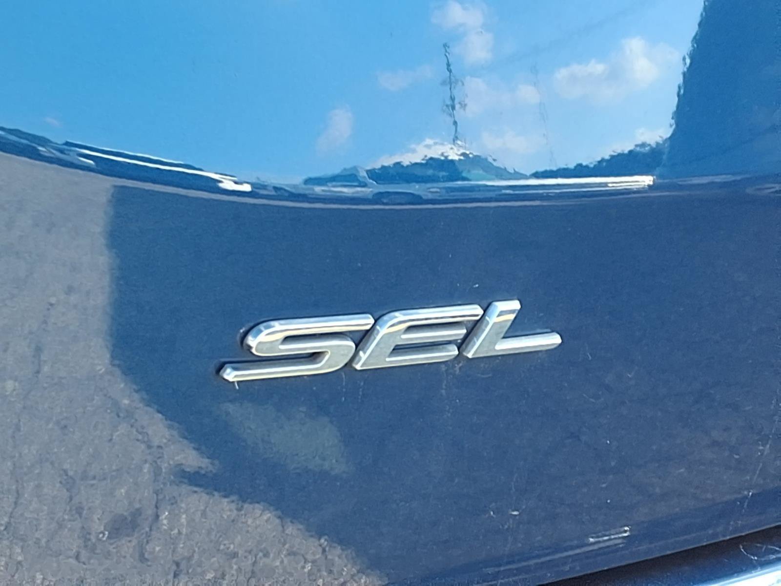 Used 2024 Atlas Blue Metallic Ford SEL image 4