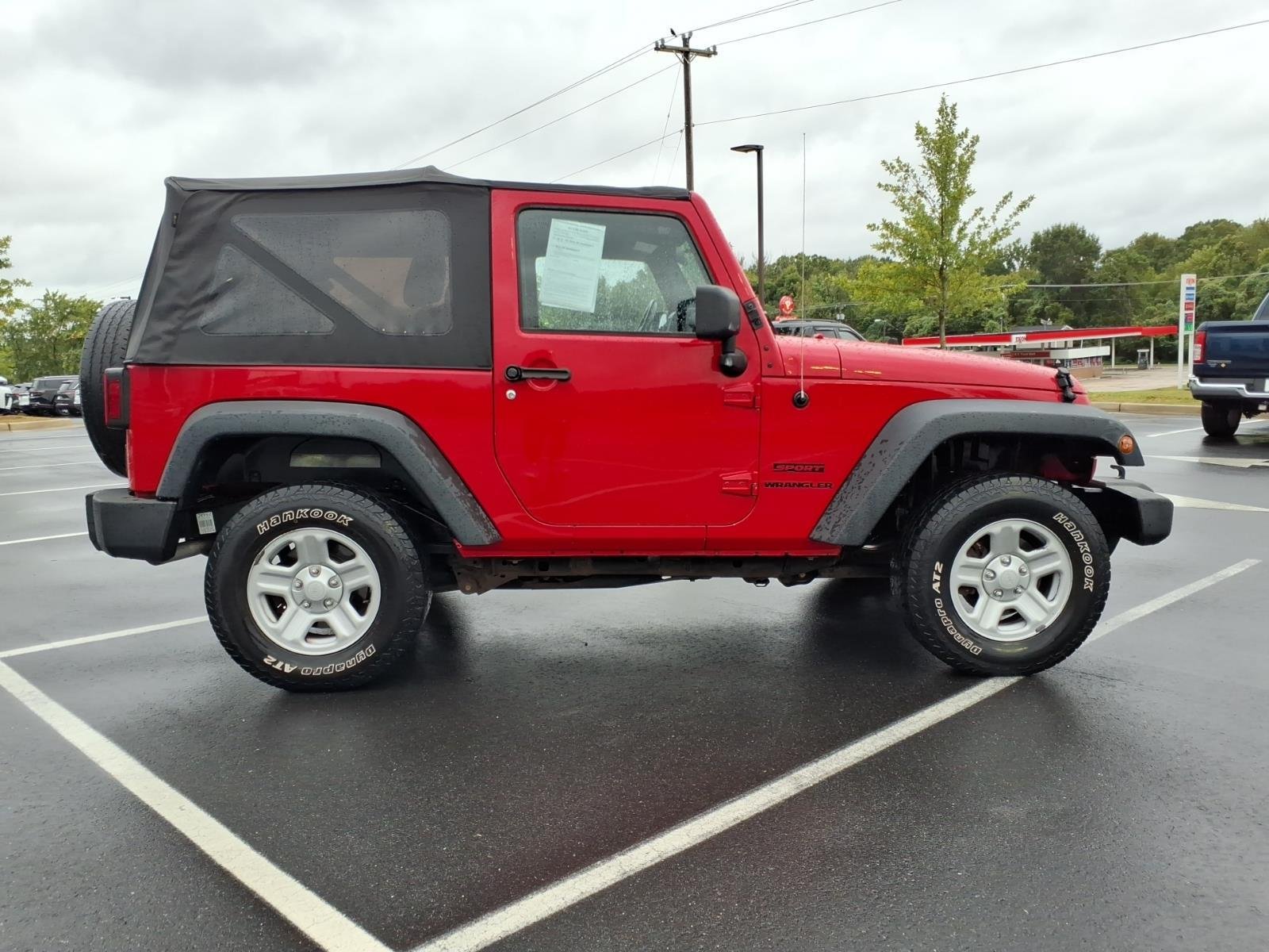 Used 2013 Flame Red Clearcoat Jeep Sport image 9