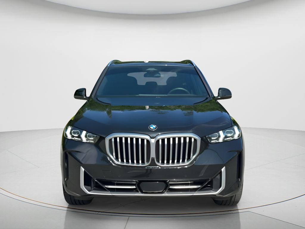 Certified Used 2025 Black Sapphire Metallic BMW xDrive40i image 2