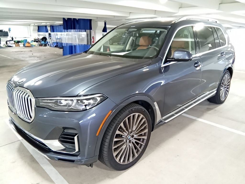 Used 2021 Arctic Gray Metallic BMW xDrive40i image 1