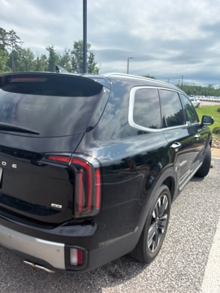 Used 2023 Ebony Black Kia SX-Prestige image 14