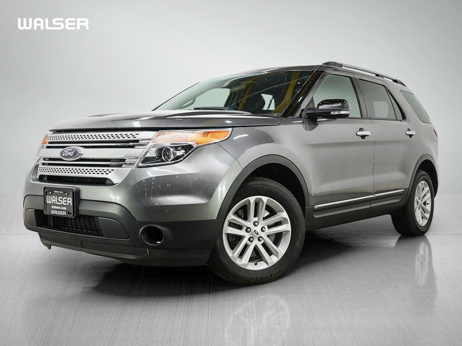 Used 2014 Sterling Gray Metallic Ford 4WD 4dr XLT image 1