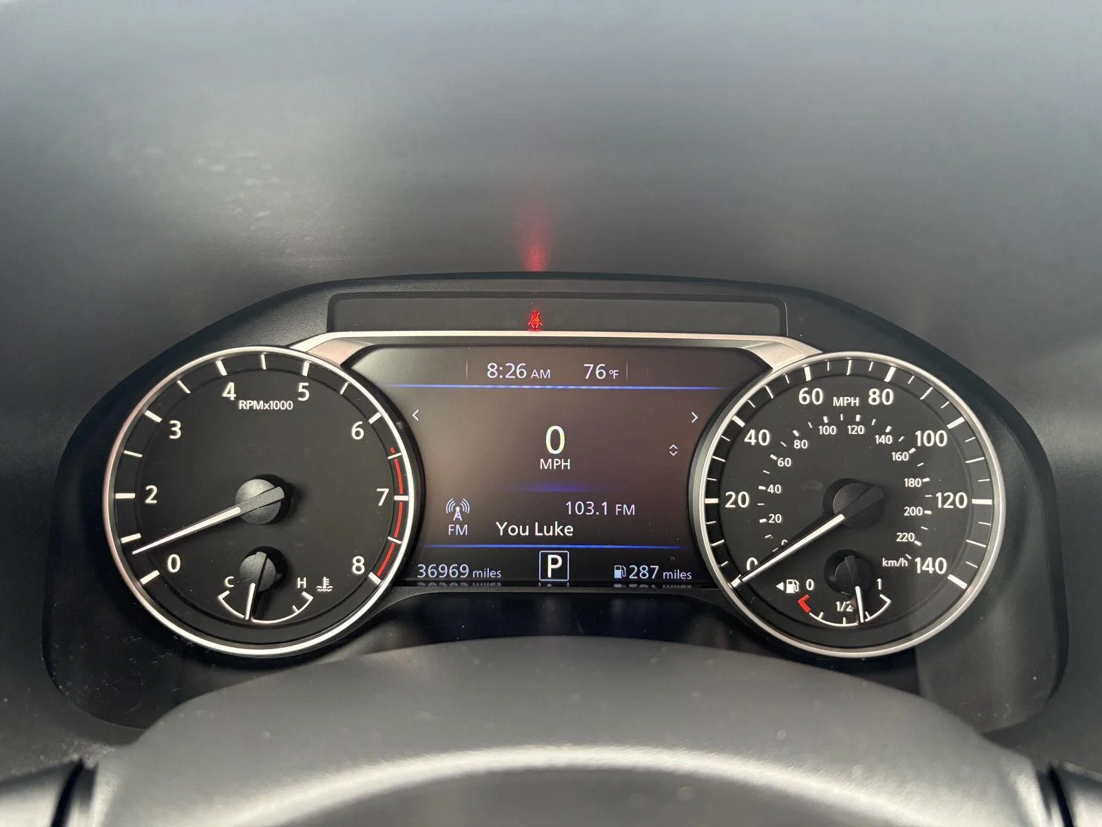 Used 2025 Garnet Pearl Metallic Nissan SV image 6