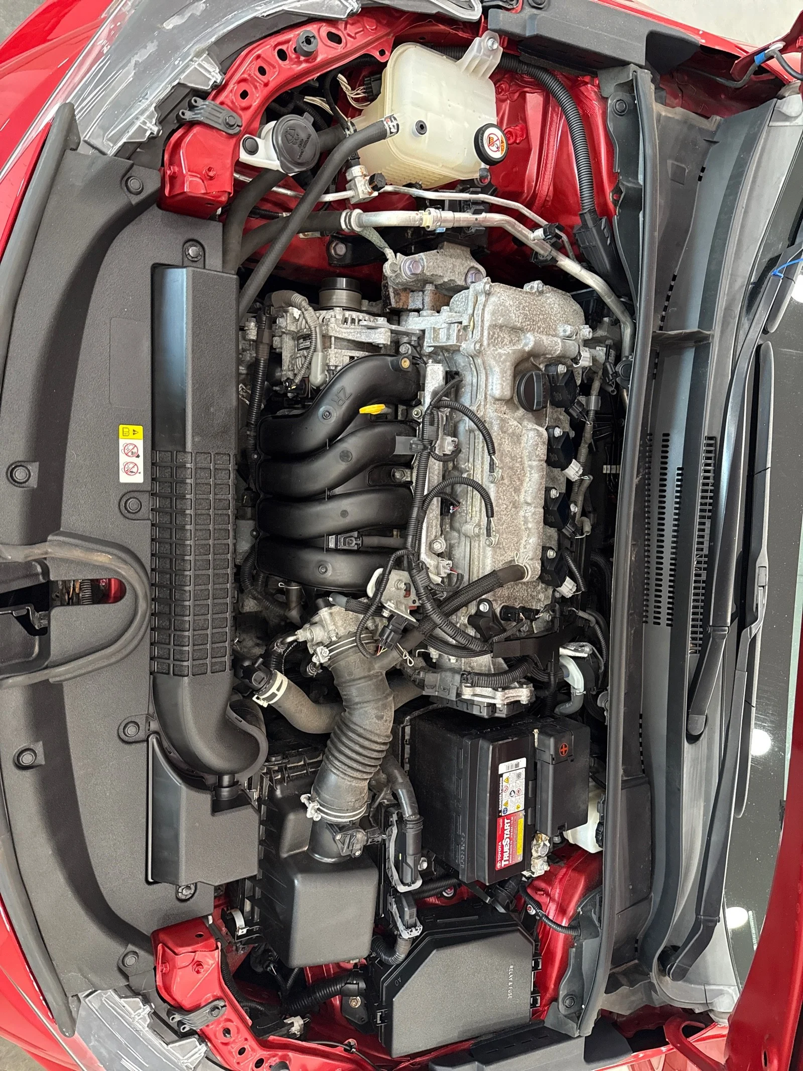 Used 2021 Barcelona Red Metallic Toyota LE image 8