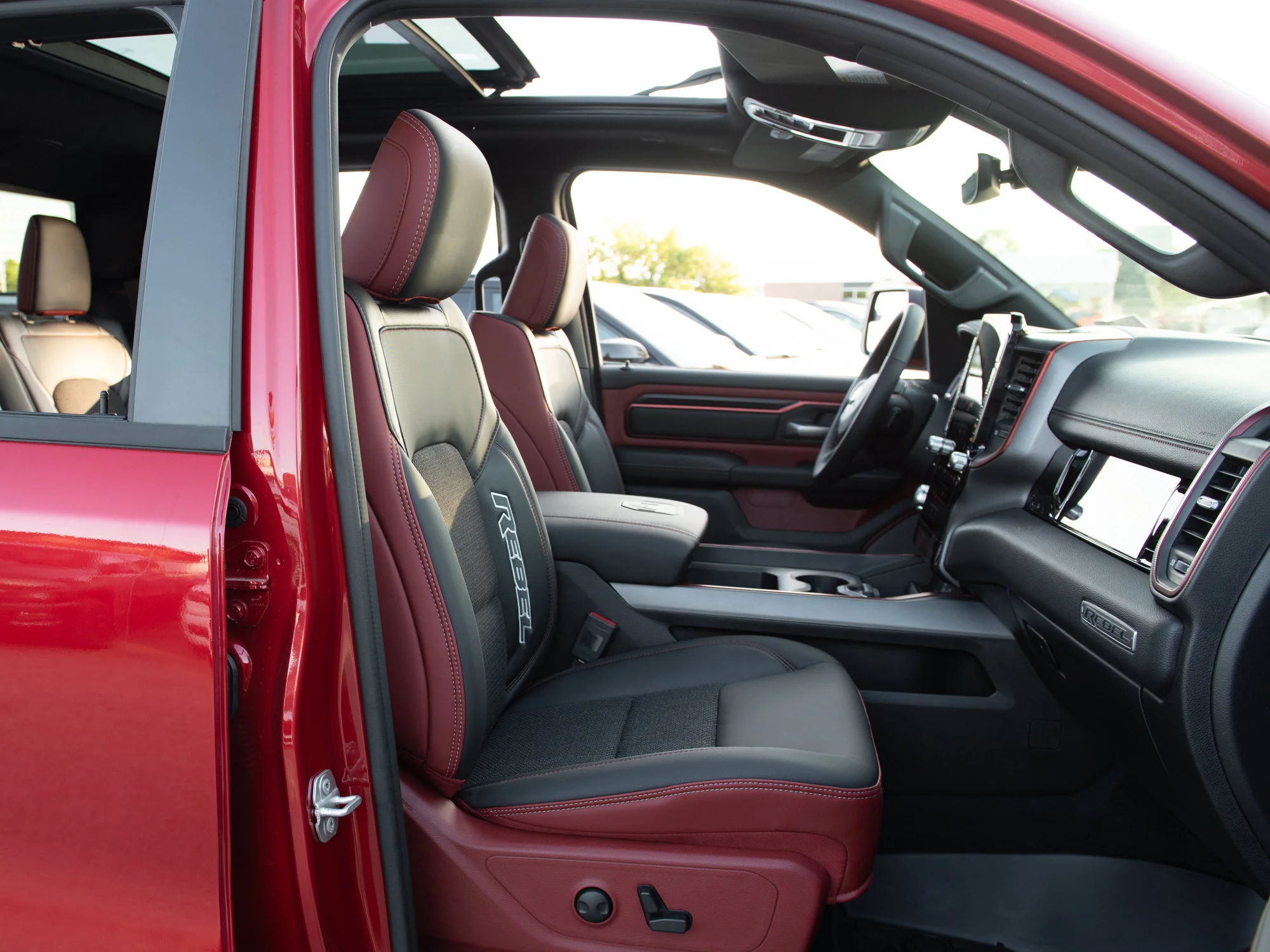 New 2026 Red RAM Rebel* Crew Cab 4x4, Pano Sunroof, 33 Inch A/T Tires, Passenger Screen image 29