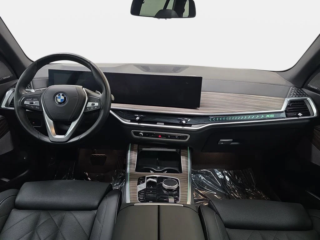 Used 2025 Black Sapphire Metallic BMW xDrive50e image 10