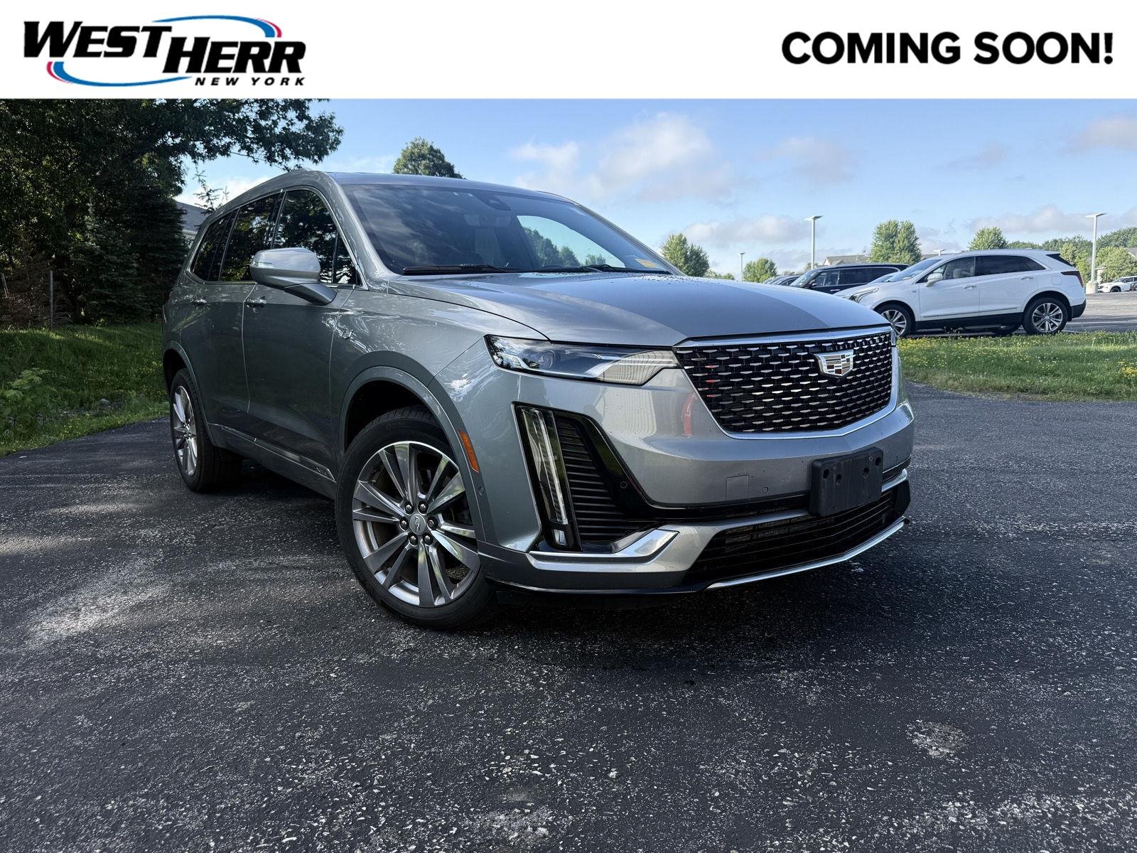 Used 2023 Argent Silver Metallic Cadillac AWD Premium Luxury image 1