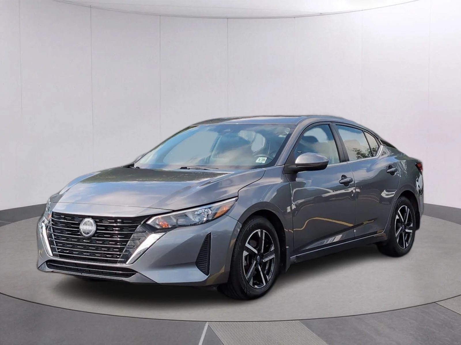 Used 2024 Gun Metallic Nissan SV image 1