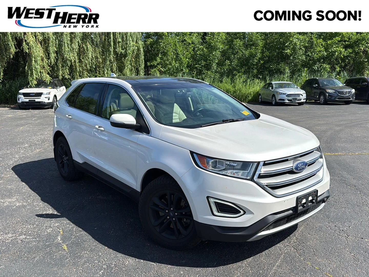 Used 2016 White Platinum Metallic Tri-Coat Ford SEL image 1