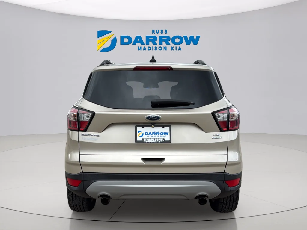Used 2018 White Gold Metallic Ford SE image 4