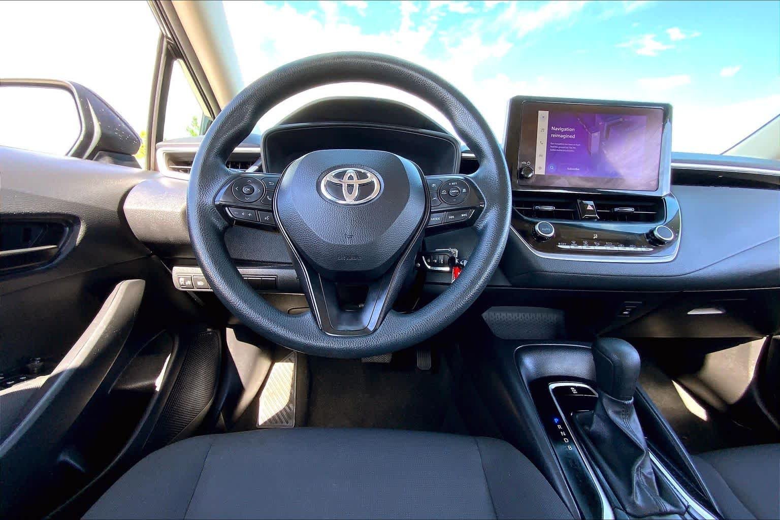 Used 2024 Midnight Black Metallic Toyota LE image 6