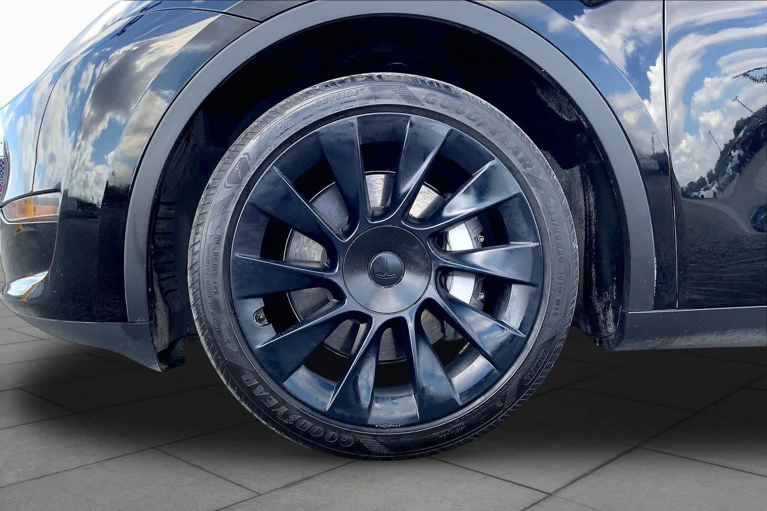 Used 2024 Solid Black Tesla  image 10