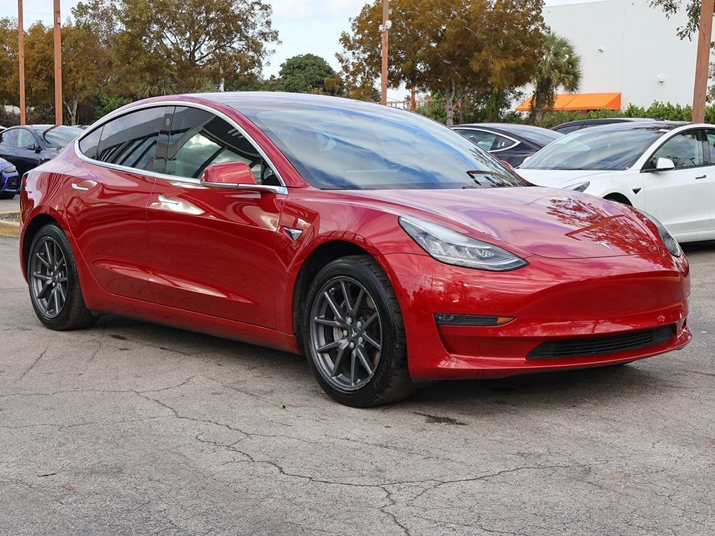 Used 2018 Tesla Model 3 Long Range with VIN 5YJ3E1EA4JF034029 for sale in Miami, FL