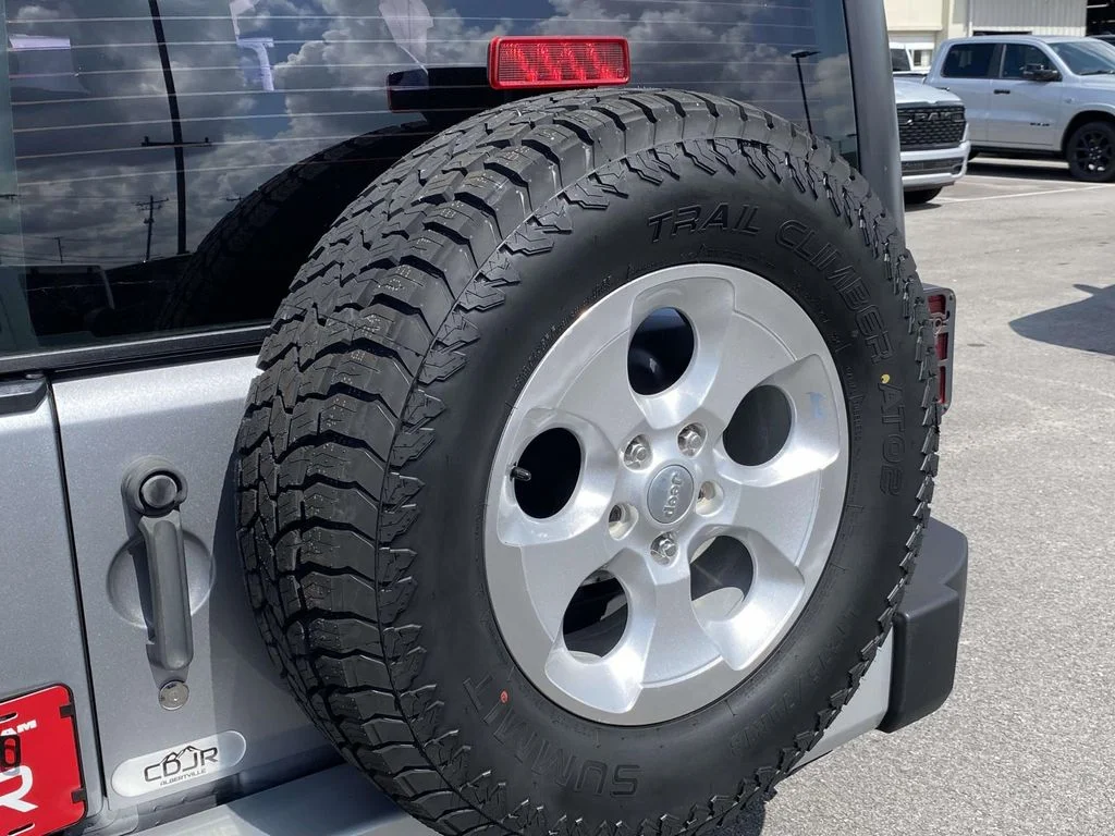 Used 2013 Silver Jeep Sport image 17
