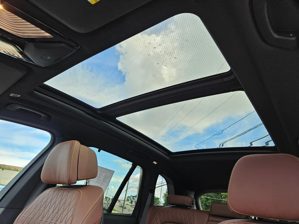 Used 2026 Mineral White Metallic BMW M60i image 44