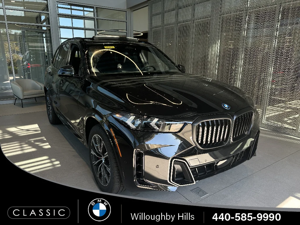 New 2026 Black Sapphire Metallic BMW xDrive50e image 1