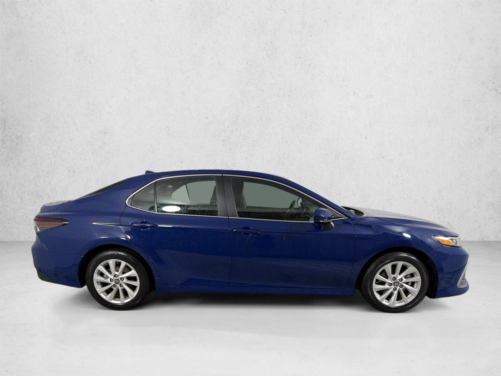 Used 2024 Reservoir Blue Toyota LE image 2
