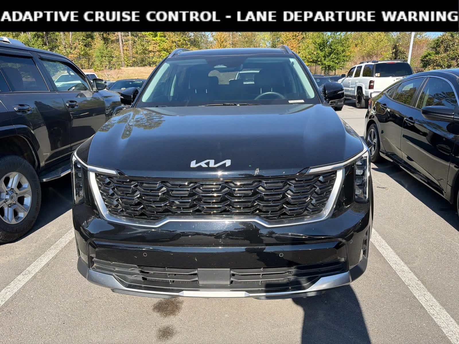 Used 2025 Ebony Black Kia S image 2