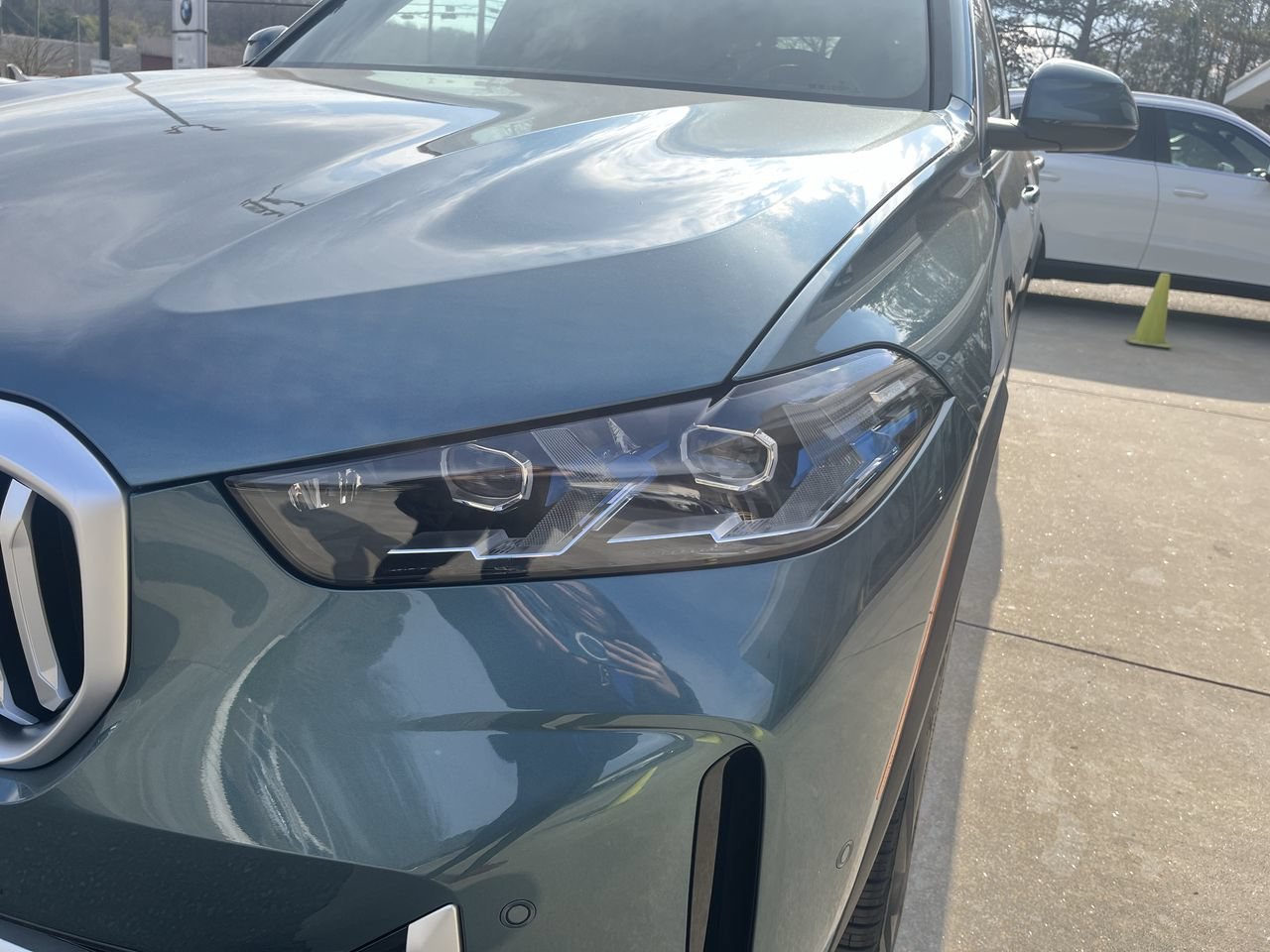 Used 2026 Blue Ridge Mountain Metallic BMW xDrive50e image 11