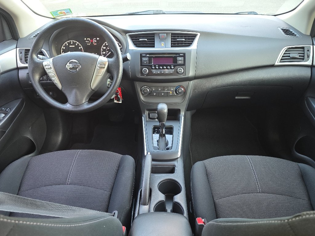 Used 2016 Super Black Nissan S image 2