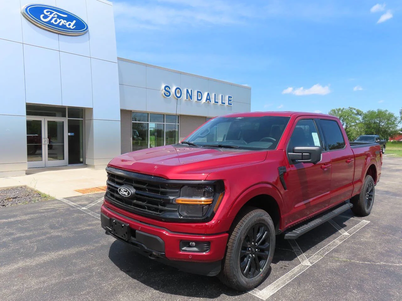 New 2026 Ruby Red Metallic Tinted Clearcoat Ford XLT 4x4 4dr SuperCrew 5.5 ft. SB image 1