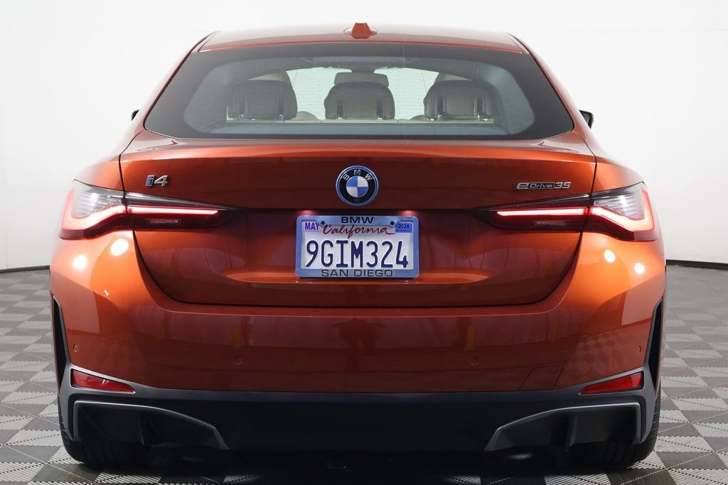 Certified Used 2023 Sunset Orange Metallic BMW eDrive35 image 5
