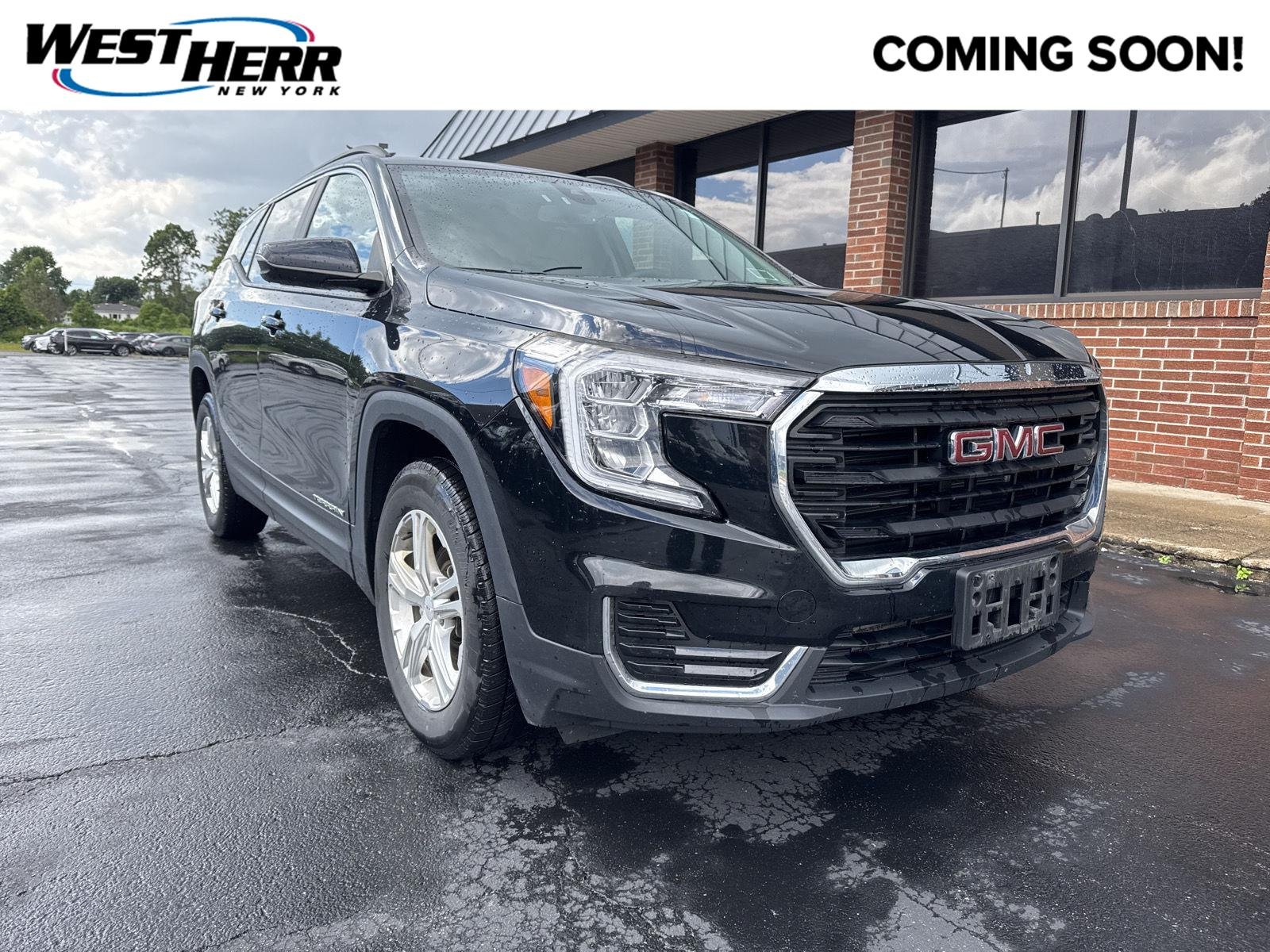 Used 2022 Ebony Twilight Metallic GMC SLE image 1