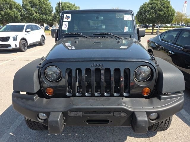 Used 2013 Black Jeep Unlimited Sahara image 2