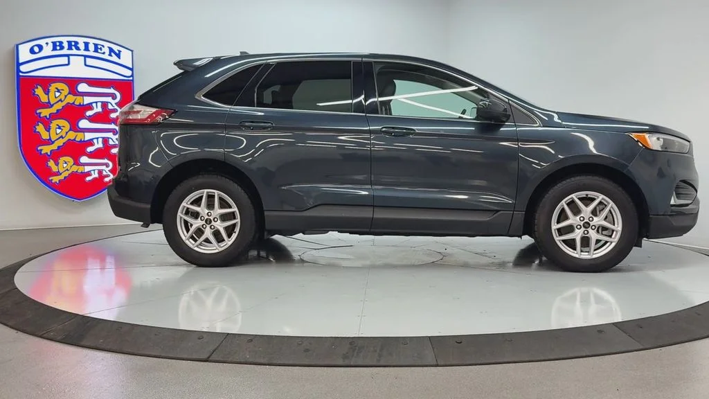 Used 2023 Blue Metallic Ford SEL image 4