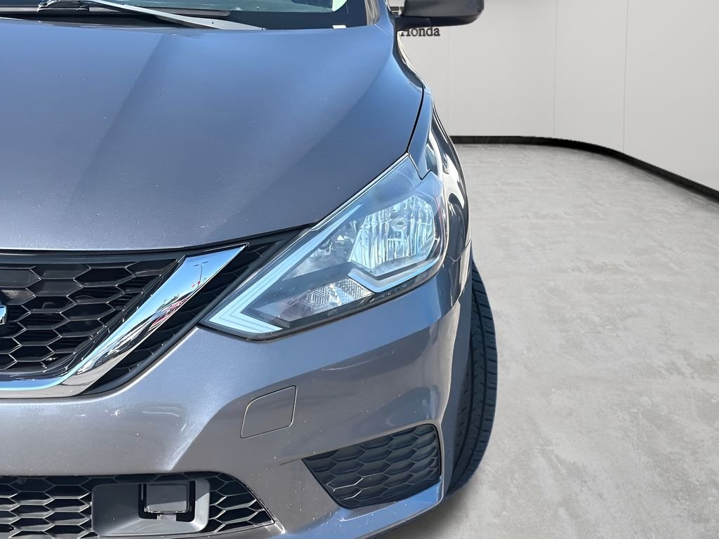 Used 2018 Gun Metallic Nissan SV image 5