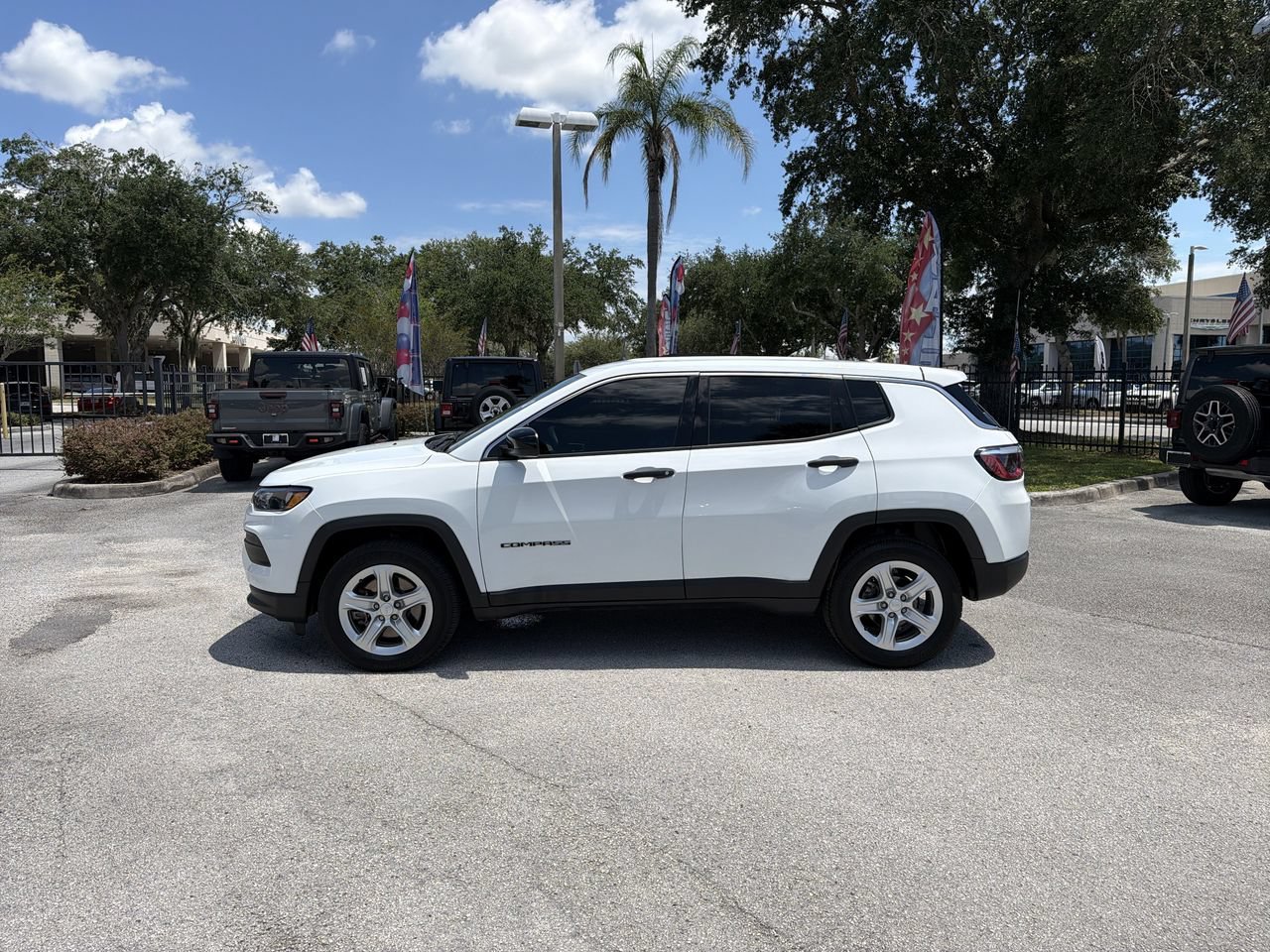 Used 2023 Bright White Clearcoat Jeep Sport image 5