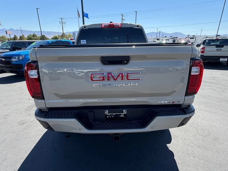 Used 2024 Desert Sand Metallic GMC AT4X image 4