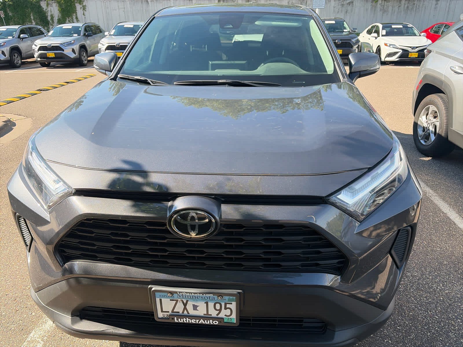 Used 2024 Magnetic Gray Metallic Toyota LE image 2