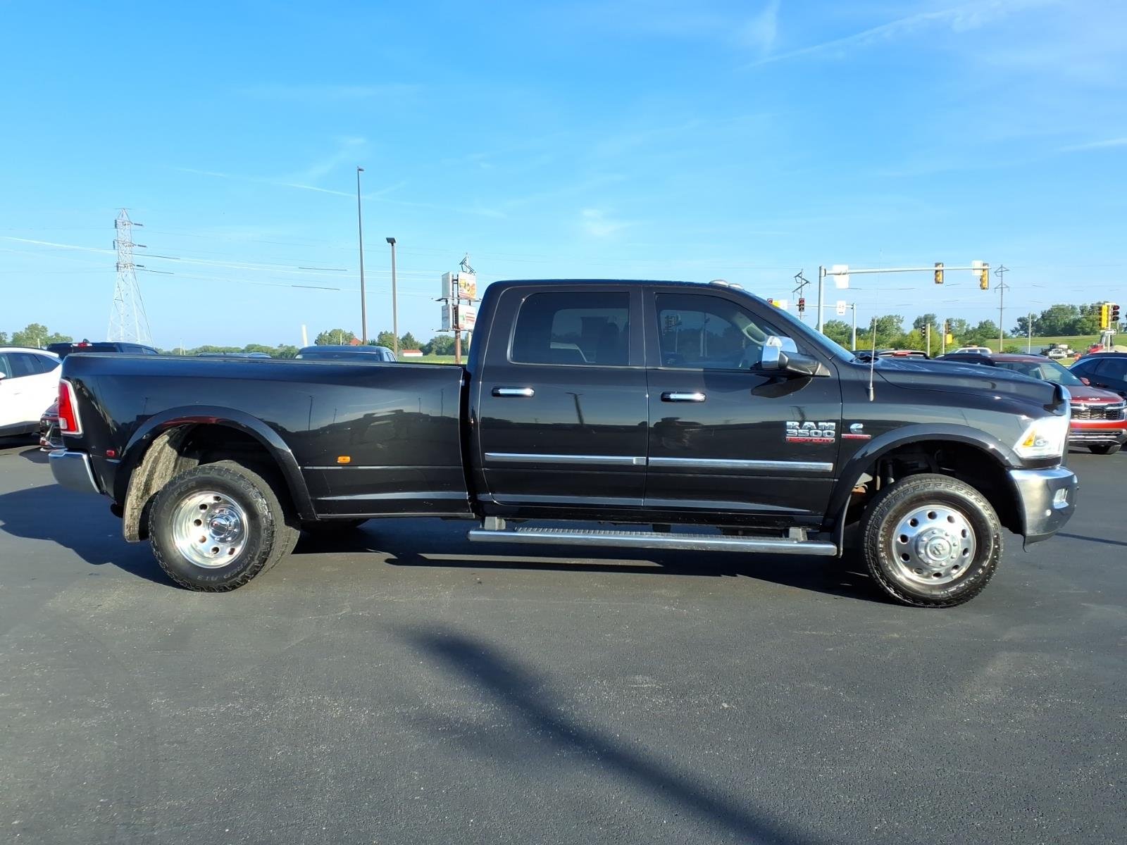 Used 2018 Brilliant Black Crystal Pearl Coat RAM Laramie image 2