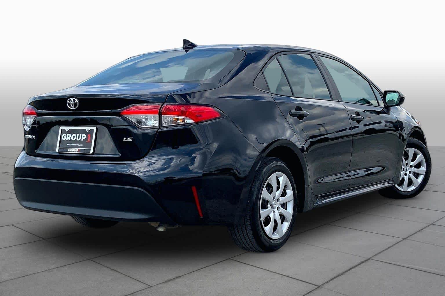 Used 2024 Midnight Black Metallic Toyota LE image 13