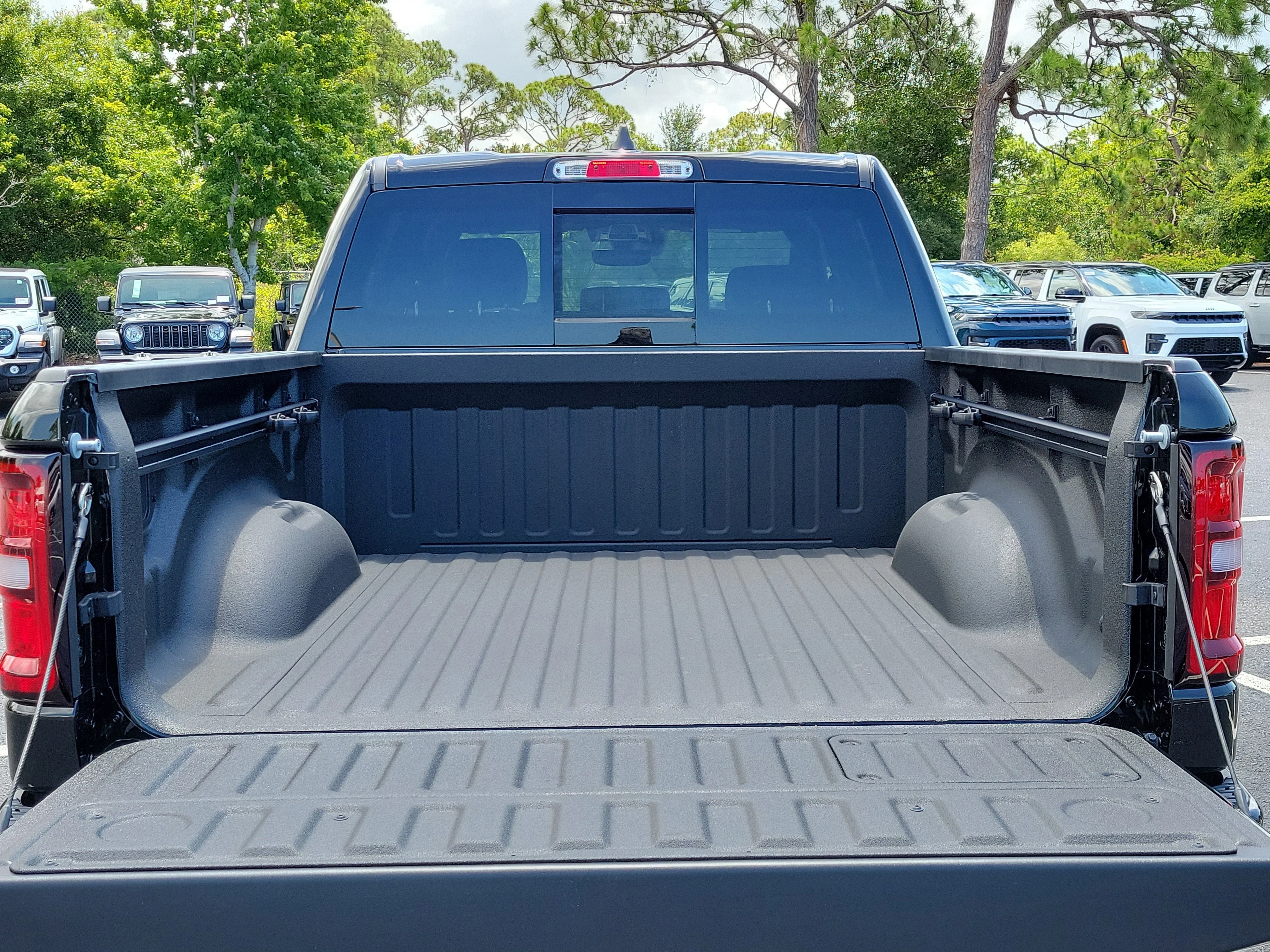 New 2026 Diamond Black Crystal Pearlcoat RAM Laramie image 10