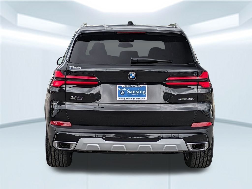 New 2026 Black Sapphire Metallic BMW sDrive40i image 4