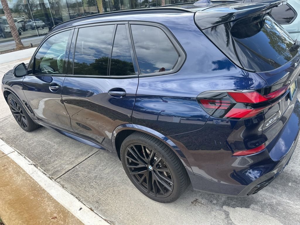 Certified Used 2024 Tanzanite Blue II Metallic BMW sDrive40i image 2
