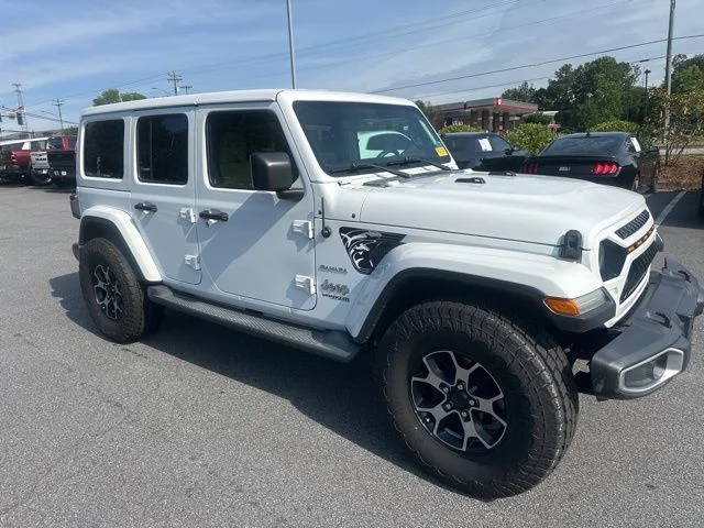 Used 2018 White Jeep Unlimited Sahara image 1
